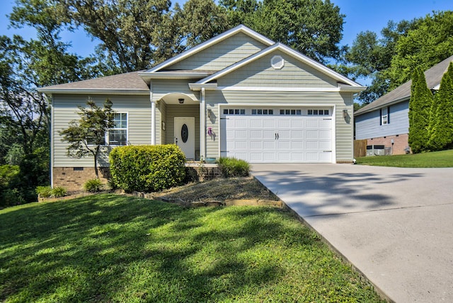 5215 Austin Rd, Hixson, TN 37343 - view of front of property featuring driveway, a garage, a front yard, and crawl space
