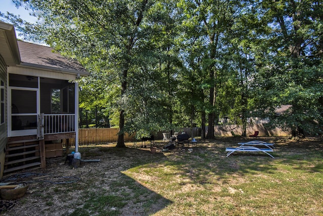 5215 Austin Rd, Hixson, TN 37343 - fenced backyard with a sunroom