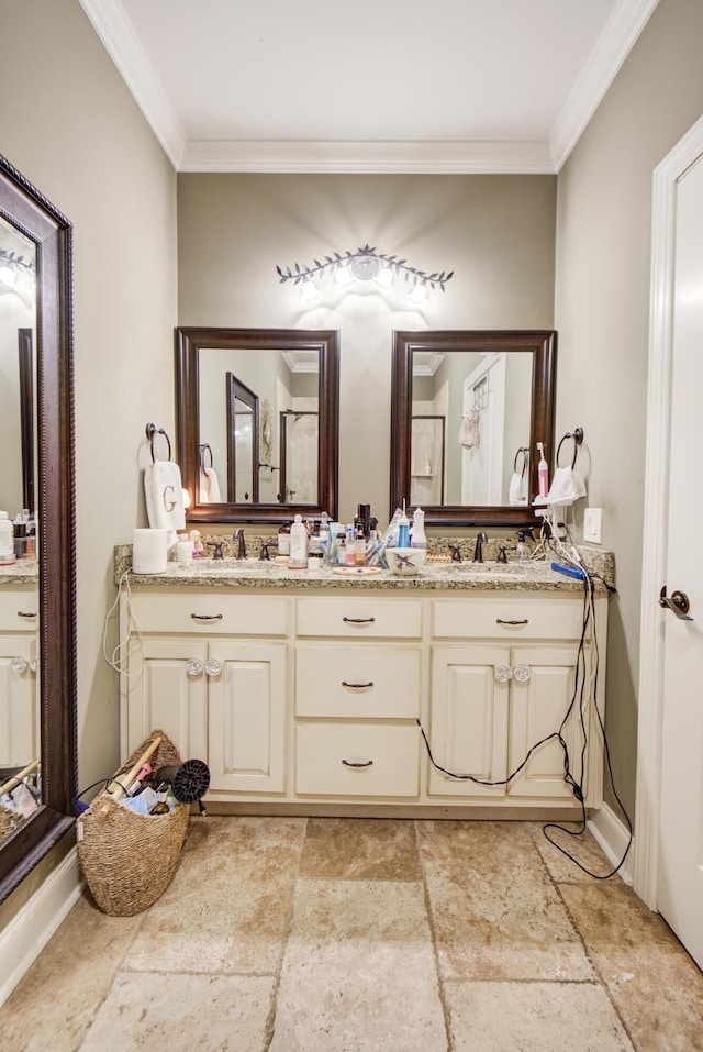5215 Austin Rd, Hixson, TN 37343 - bathroom featuring crown molding, stone tile floors, and double vanity