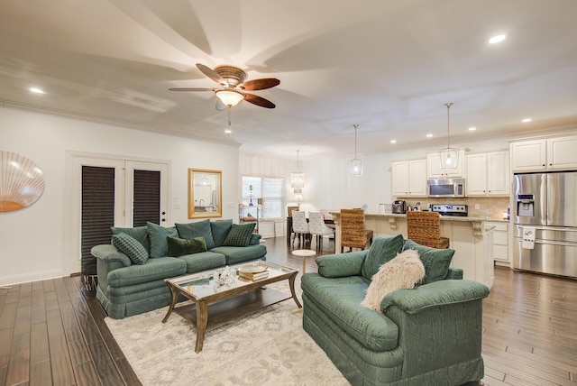 5215 Austin Rd, Hixson, TN 37343 - living room with a ceiling fan, dark wood finished floors, recessed lighting, and crown molding