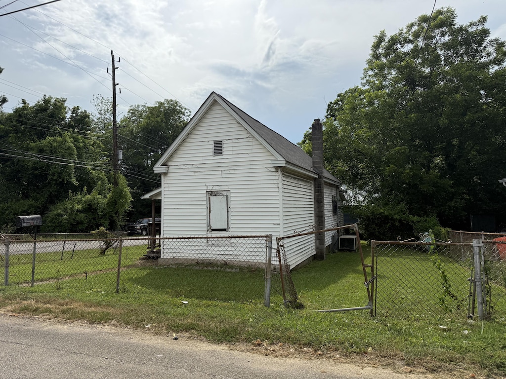 1701 Stanfiel St, Chattanooga, TN 37406 - view of property exterior with a chimney and a cooling unit