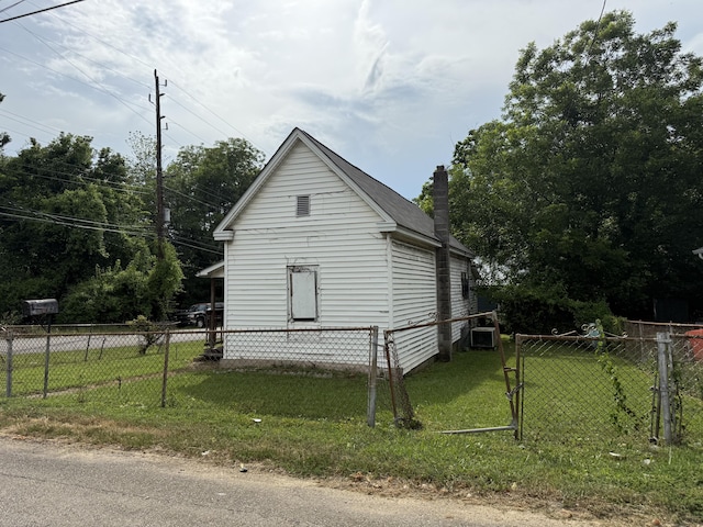 1701 Stanfiel St, Chattanooga, TN 37406 - view of property exterior with a chimney and a cooling unit