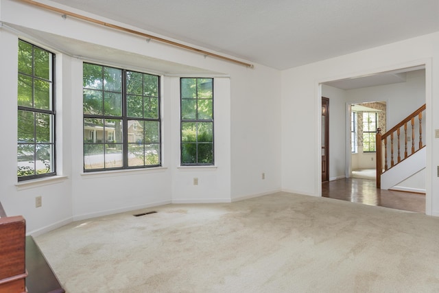 6515 Lake Shadows Cir, Hixson, TN 37343 - unfurnished room with carpet flooring and stairs
