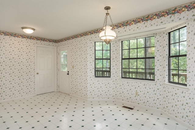 6515 Lake Shadows Cir, Hixson, TN 37343 - unfurnished room featuring wallpapered walls and tile patterned floors
