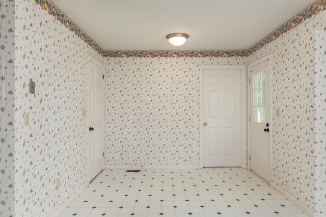 6515 Lake Shadows Cir, Hixson, TN 37343 - entrance foyer featuring wallpapered walls and light floors