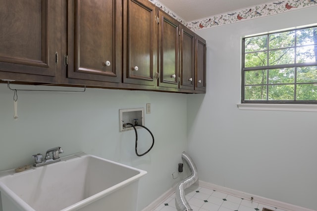 6515 Lake Shadows Cir, Hixson, TN 37343 - laundry room featuring cabinet space and hookup for a washing machine