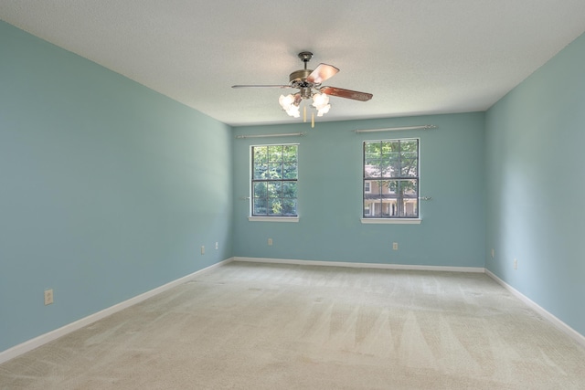6515 Lake Shadows Cir, Hixson, TN 37343 - spare room featuring light colored carpet and ceiling fan