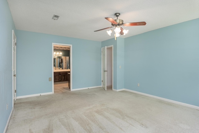 6515 Lake Shadows Cir, Hixson, TN 37343 - unfurnished bedroom with carpet, ensuite bathroom, a ceiling fan, and a textured ceiling