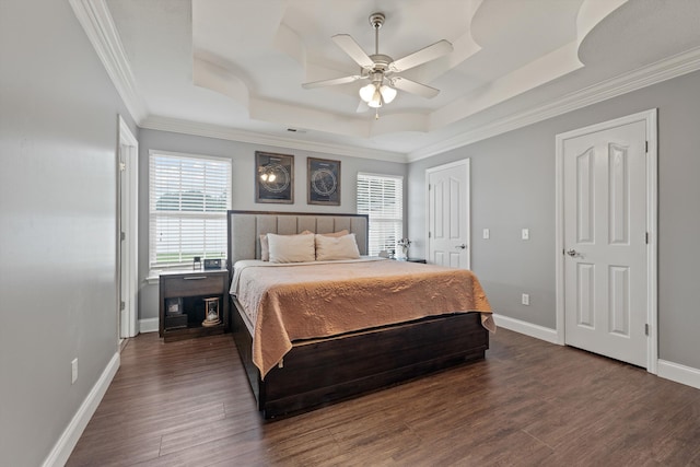90 Quail Run, Lafayette, GA 30728 - bedroom featuring a raised ceiling, crown molding, dark wood-type flooring, and a ceiling fan