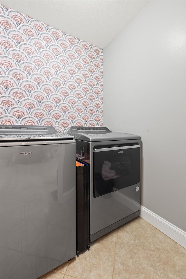 90 Quail Run, Lafayette, GA 30728 - washroom with washing machine and clothes dryer and light tile patterned floors