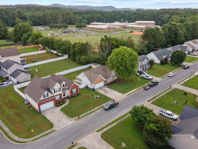 90 Quail Run, Lafayette, GA 30728 - aerial view of residential area featuring a mountain backdrop and a forest