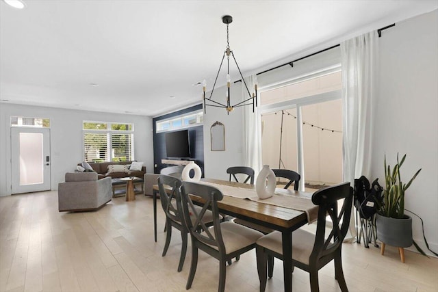 1493 Sinclair Ave, Chattanooga, TN 37408 - dining area featuring light wood-style floors and a chandelier