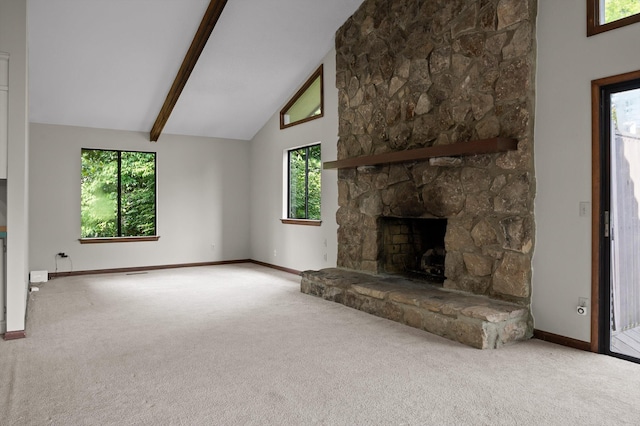 4128 Hamill Rd, Hixson, TN 37343 - unfurnished living room with carpet flooring, healthy amount of natural light, high vaulted ceiling, a stone fireplace, and beamed ceiling
