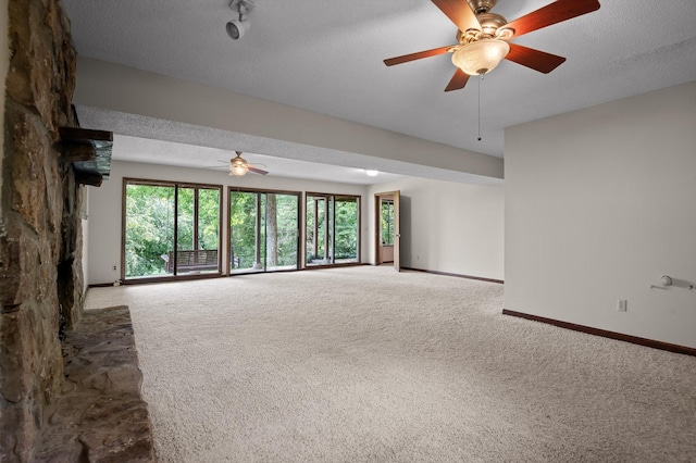 4128 Hamill Rd, Hixson, TN 37343 - unfurnished living room with carpet, ceiling fan, and a textured ceiling