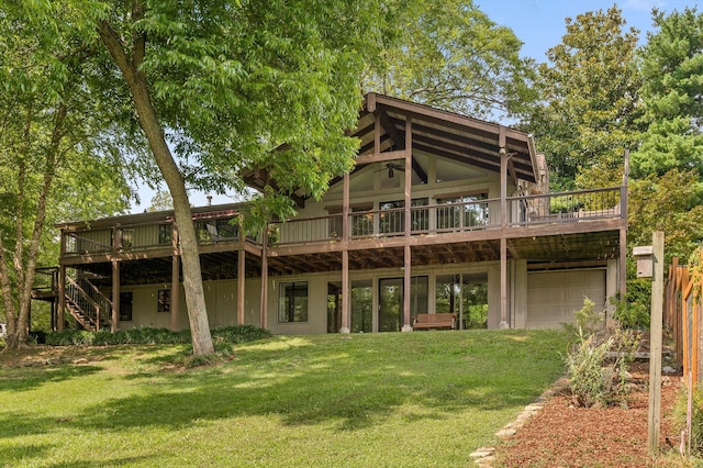 4128 Hamill Rd, Hixson, TN 37343 - back of property with a wooden deck, a yard, and a garage
