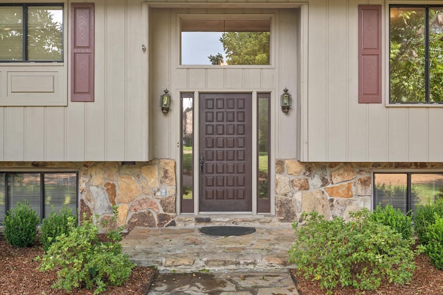 4128 Hamill Rd, Hixson, TN 37343 - doorway to property with stone siding and board and batten siding
