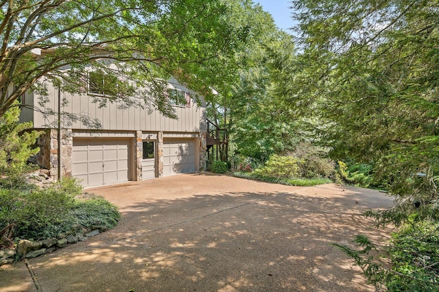 4128 Hamill Rd, Hixson, TN 37343 - view of side of home featuring a garage and driveway