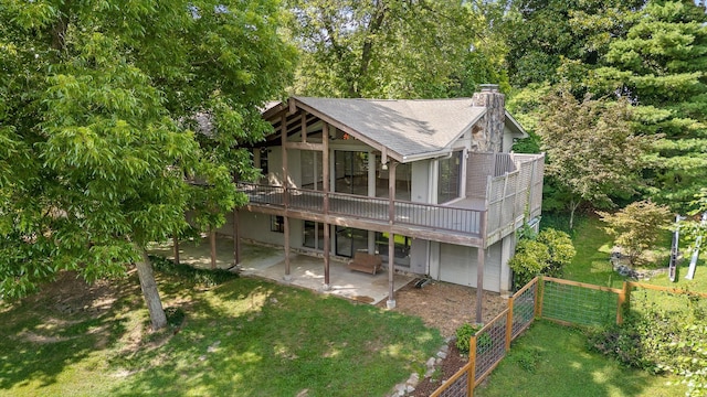 4128 Hamill Rd, Hixson, TN 37343 - back of house with roof with shingles, a patio area, a chimney, and a deck