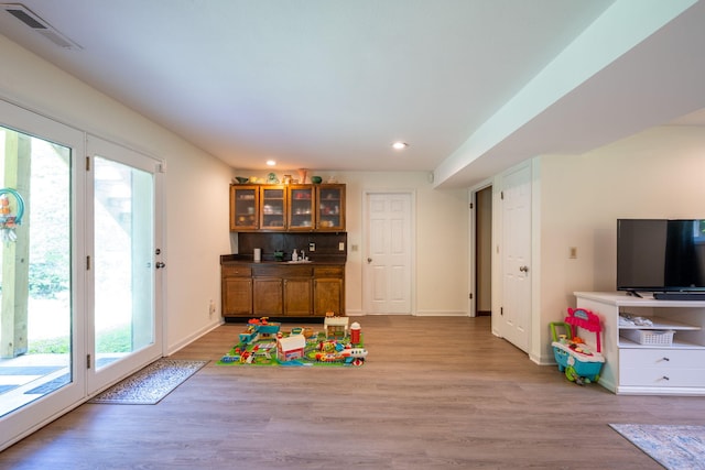 1107 Copperwood Dr, Hixson, TN 37343 - rec room with light wood finished floors, recessed lighting, and healthy amount of natural light
