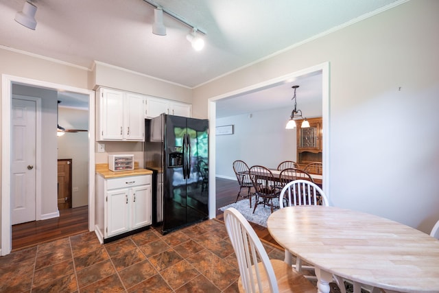 1107 Copperwood Dr, Hixson, TN 37343 - kitchen with black refrigerator with ice dispenser, white cabinetry, track lighting, light countertops, and decorative light fixtures