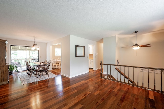 1107 Copperwood Dr, Hixson, TN 37343 - dining area with wood finished floors, a textured ceiling, and a ceiling fan