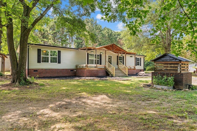 1483 Resaca Lafayette Rd NW, Resaca, GA 30735 - manufactured / mobile home with crawl space, covered porch, and an outbuilding