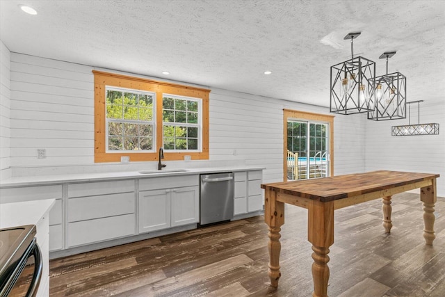 1483 Resaca Lafayette Rd NW, Resaca, GA 30735 - kitchen featuring appliances with stainless steel finishes, dark wood-type flooring, a textured ceiling, light countertops, and a chandelier