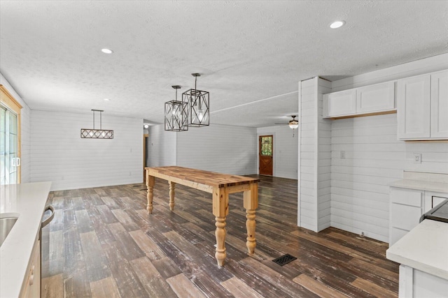 1483 Resaca Lafayette Rd NW, Resaca, GA 30735 - dining area featuring a textured ceiling, dark wood-style flooring, healthy amount of natural light, ceiling fan, and recessed lighting