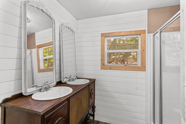 1483 Resaca Lafayette Rd NW, Resaca, GA 30735 - full bathroom with double vanity, a shower stall, a textured ceiling, and wooden walls