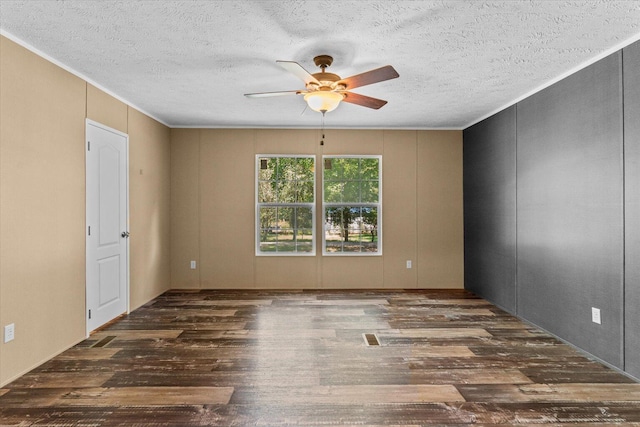 1483 Resaca Lafayette Rd NW, Resaca, GA 30735 - empty room featuring wood finished floors, ceiling fan, a textured ceiling, ornamental molding, and a decorative wall