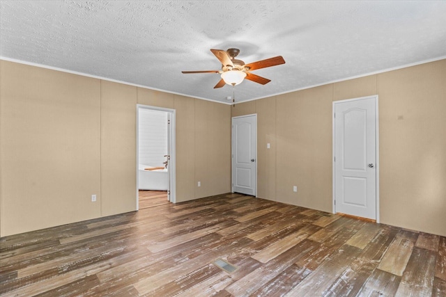 1483 Resaca Lafayette Rd NW, Resaca, GA 30735 - empty room with hardwood / wood-style floors, ceiling fan, crown molding, and a textured ceiling