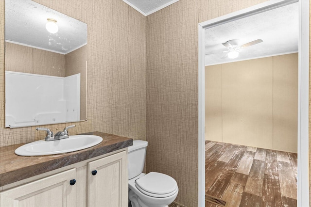 1483 Resaca Lafayette Rd NW, Resaca, GA 30735 - bathroom featuring ornamental molding, a ceiling fan, wood finished floors, vanity, and a textured ceiling