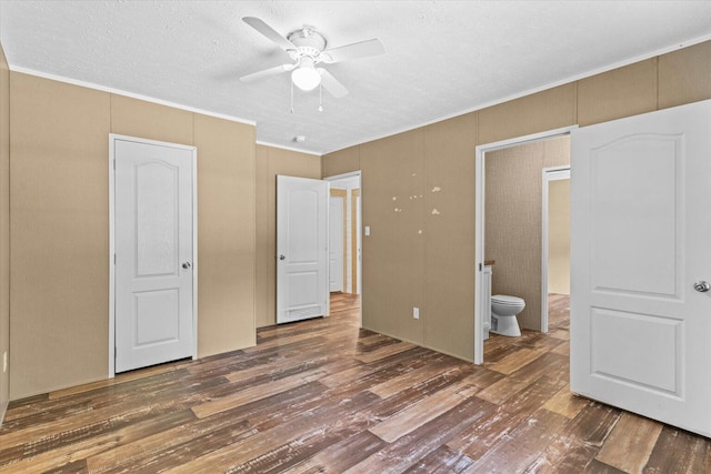 1483 Resaca Lafayette Rd NW, Resaca, GA 30735 - unfurnished bedroom featuring wood finished floors, connected bathroom, ornamental molding, a textured ceiling, and a ceiling fan