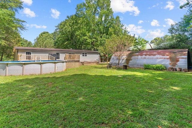 1483 Resaca Lafayette Rd NW, Resaca, GA 30735 - view of grassy yard featuring an outdoor pool and a deck