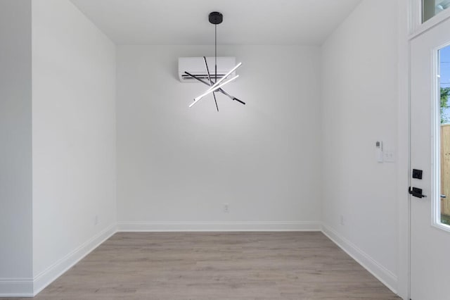1306 Top St, Chattanooga, TN 37408 - unfurnished dining area featuring a chandelier and light wood-type flooring