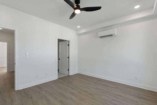 1306 Top St, Chattanooga, TN 37408 - unfurnished room featuring wood finished floors, a ceiling fan, recessed lighting, and an AC wall unit