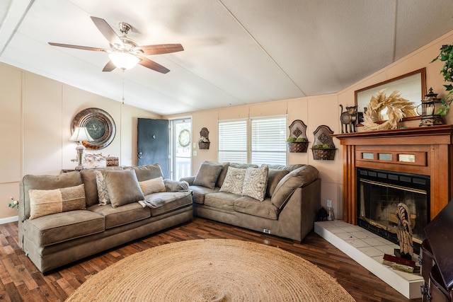 63 Applewood Ln, Chatsworth, GA 30705 - living room with lofted ceiling, wood finished floors, ceiling fan, and a fireplace