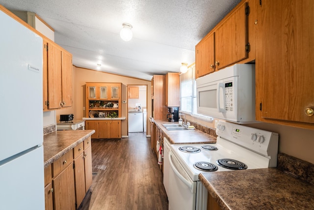 63 Applewood Ln, Chatsworth, GA 30705 - kitchen featuring white appliances, lofted ceiling, dark wood finished floors, washer / dryer, and a textured ceiling