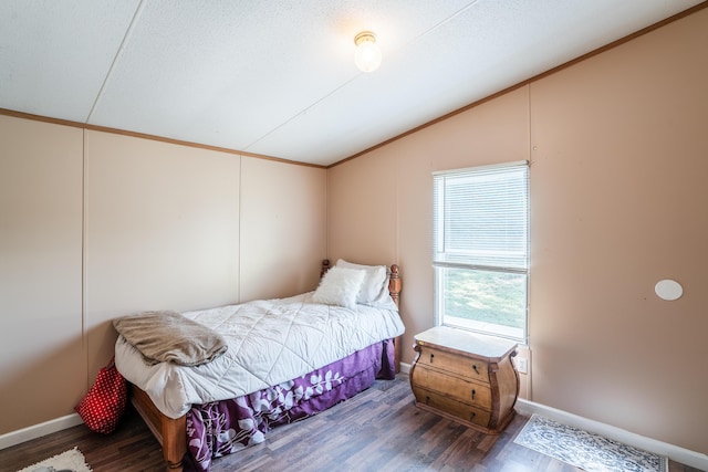 63 Applewood Ln, Chatsworth, GA 30705 - bedroom featuring lofted ceiling, ornamental molding, and wood finished floors