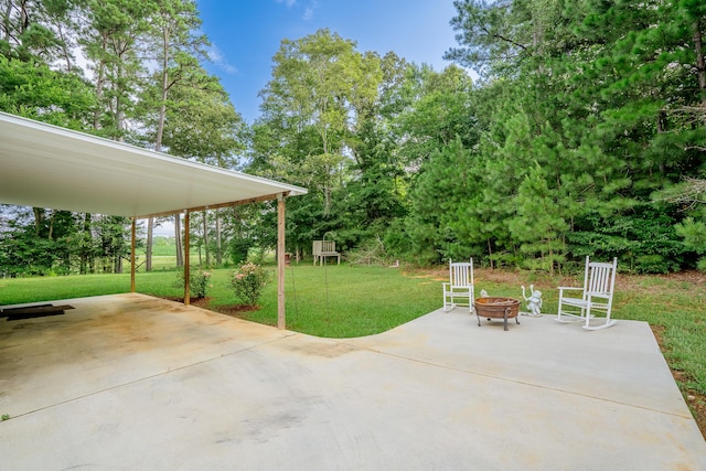 63 Applewood Ln, Chatsworth, GA 30705 - view of patio / terrace with an outdoor fire pit and view of scattered trees