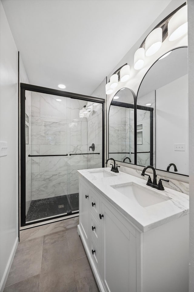 2427 Maplewood Dr, Chattanooga, TN 37421 - bathroom featuring double vanity and a stall shower
