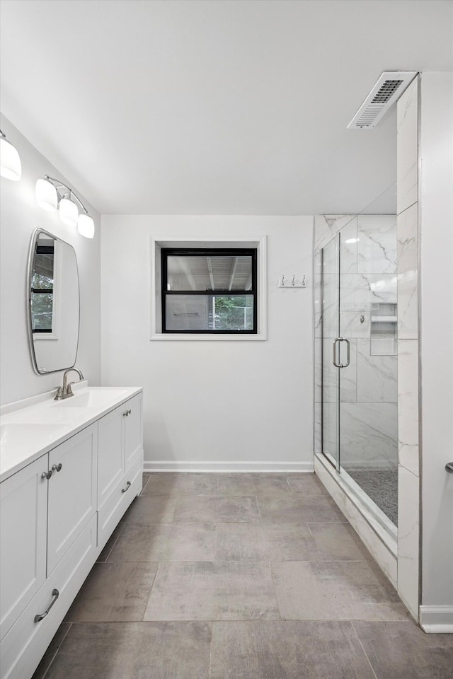 2427 Maplewood Dr, Chattanooga, TN 37421 - bathroom with vanity and a marble finish shower