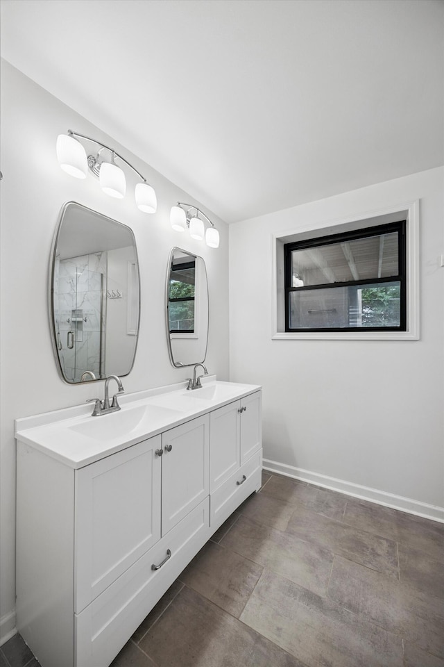 2427 Maplewood Dr, Chattanooga, TN 37421 - bathroom featuring double vanity and a shower