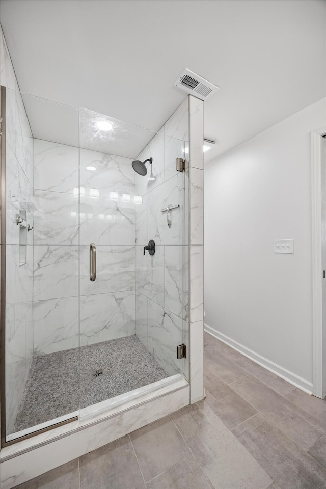 2427 Maplewood Dr, Chattanooga, TN 37421 - bathroom featuring a marble finish shower