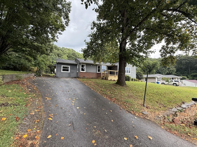 4806 Orchard View Dr, Chattanooga, TN 37415 - single story home featuring asphalt driveway, brick siding, and a front lawn