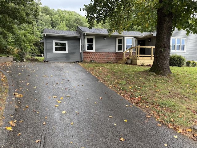 4806 Orchard View Dr, Chattanooga, TN 37415 - ranch-style house featuring asphalt driveway, brick siding, and a front lawn