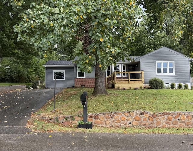 4806 Orchard View Dr, Chattanooga, TN 37415 - view of front facade with a front lawn, crawl space, and asphalt driveway