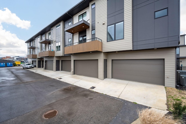 745 Burnside Pl, Chattanooga, TN 37408 - view of building exterior featuring a garage and driveway