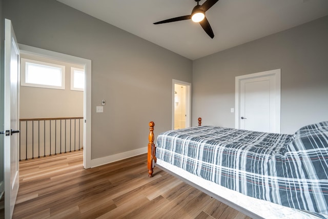745 Burnside Pl, Chattanooga, TN 37408 - bedroom featuring wood finished floors, ceiling fan, and connected bathroom