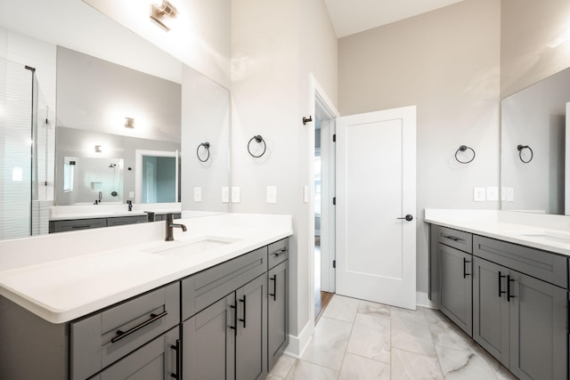 745 Burnside Pl, Chattanooga, TN 37408 - bathroom featuring marble look tiles, two vanities, and a shower stall